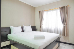 Cozy and Simply Look 2BR at 12nd Floor Puri Garden Apartment By Travelio